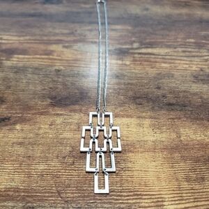 silver tone long statement necklace